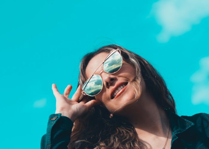 Blue sky and sun glasses